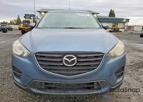 2016 Mazda Cx-5 Sport from USA, damaged, VIN JM3KE2BYXG0676157